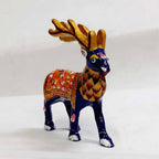 Side view of embossed enamel deer showpiece from Jaipur, 8cm length metal handicraft
