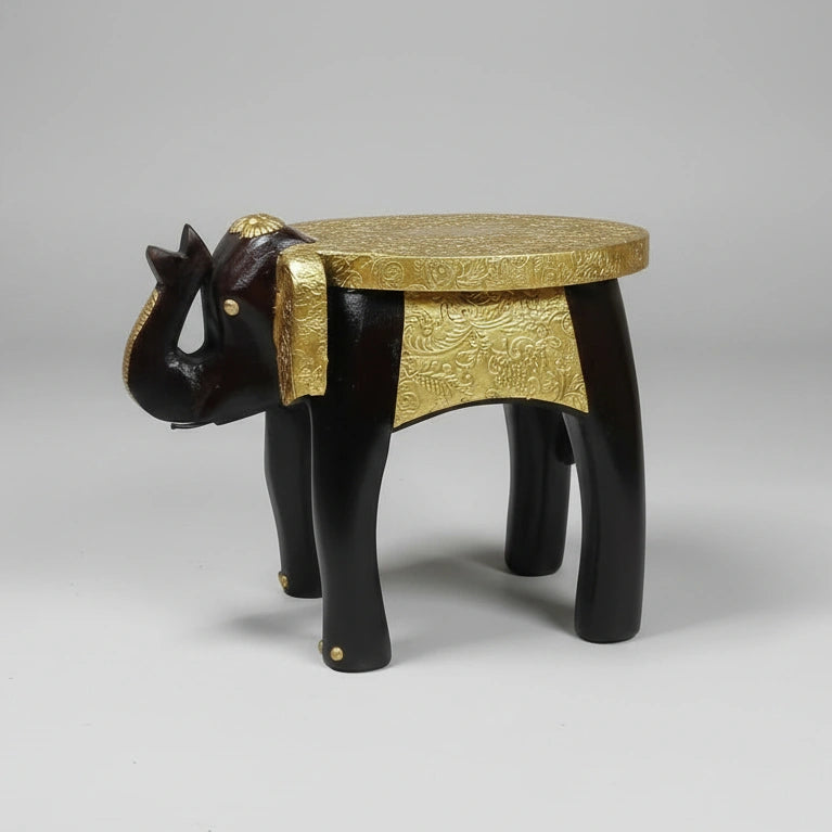 Traditional Indian side table with brass inlay and embossed metal elephant motifs.