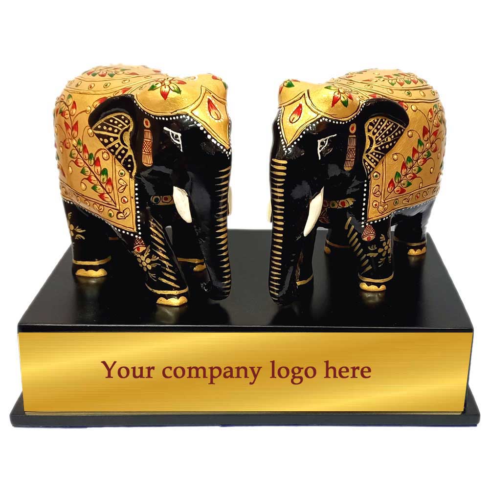 A hand-carved wooden elephant souvenir from India, a true piece of traditional art.