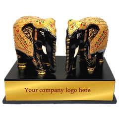 A hand-carved wooden elephant souvenir from India, a true piece of traditional art.