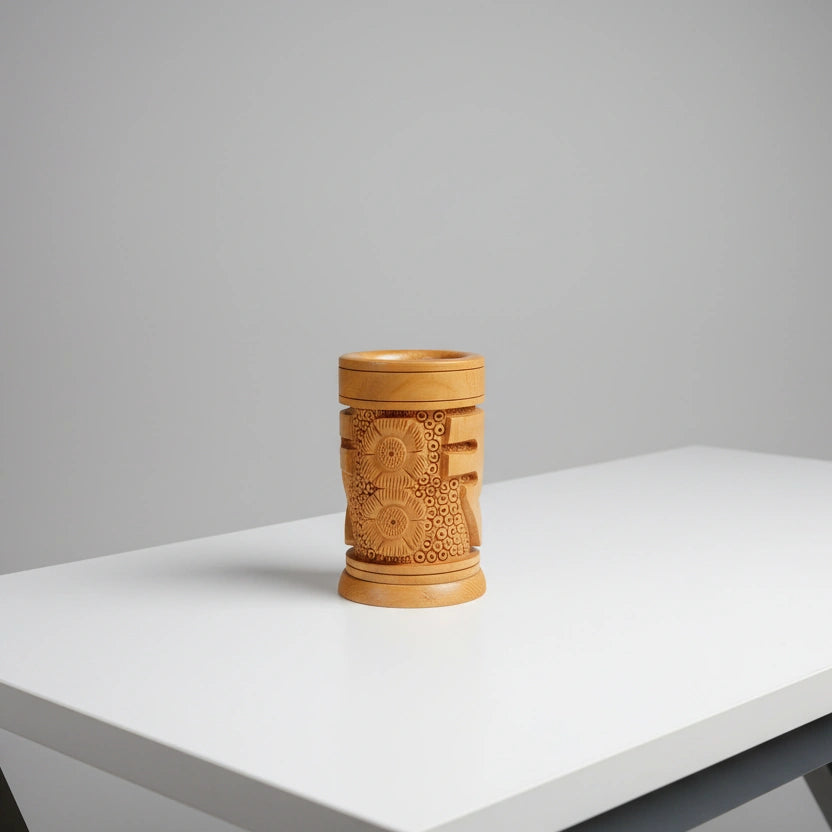 A perfectly round 6cm diameter wooden pen stand showing the iconic Indian currency mark in a minimalist, modern style.