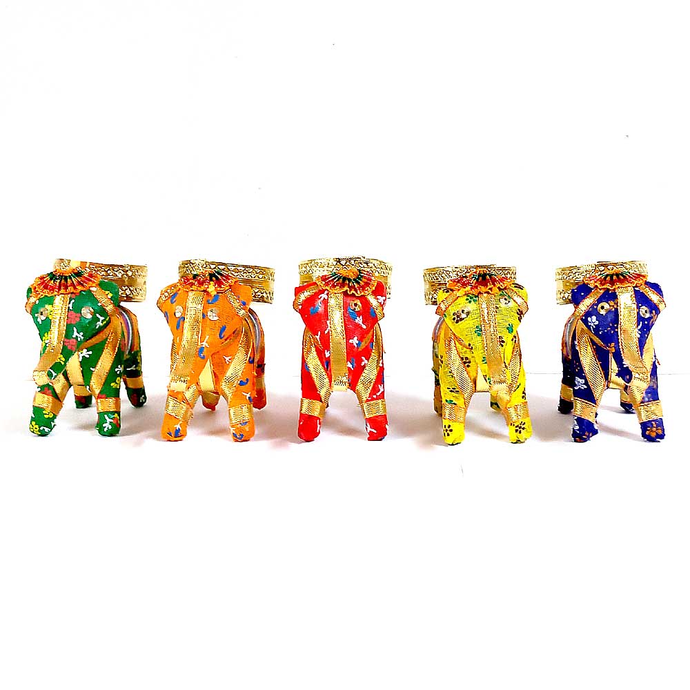 Colorful handmade elephant candle holder with metal mesh for candles.