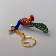 Artistic enamel-painted Meenakari peacock keychain for daily use.