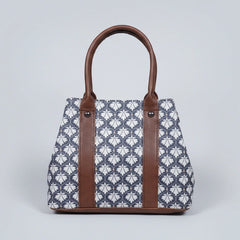 Close-up detail of the premium quality cotton fabric showing the vibrant floral print and high-stitch ethnic pattern.