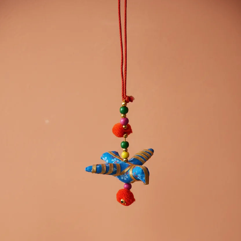 Handcrafted Blue Cotton Printed Fabric Bird Hanging with Gold Detailing, Red Cord, Multicolour Beads and Pom Poms