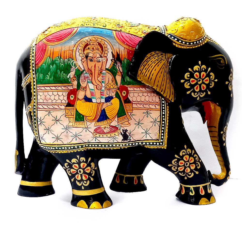 A traditional Indian cultural art piece, a wooden elephant Ganesha statue.