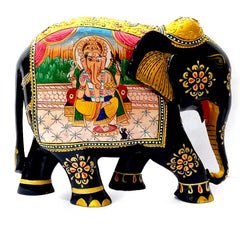 A traditional Indian cultural art piece, a wooden elephant Ganesha statue.