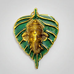 Metal leaf Ganesh showpiece with custom printing option for bride and groom names or company logos.