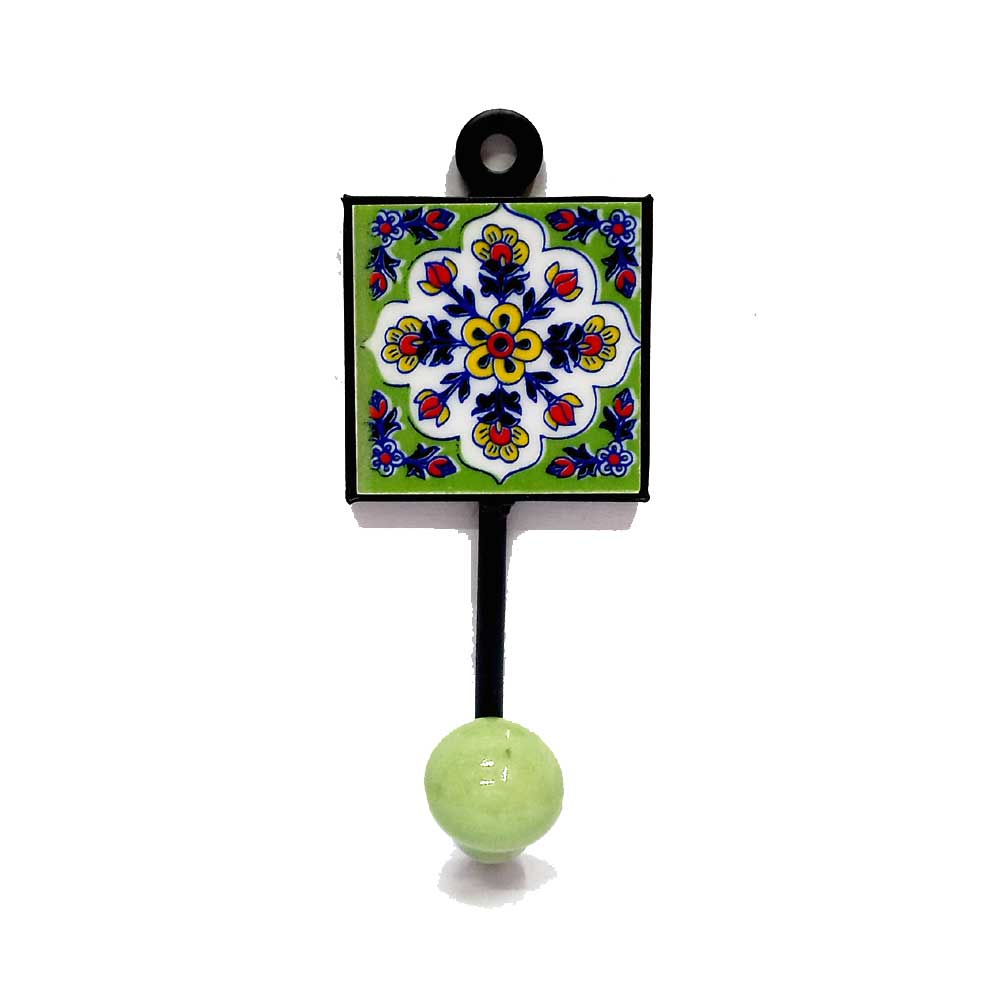 A decorative Blue Pottery key holder and wall hook, a beautiful addition to your home.