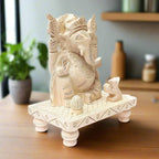 Decorative Chowki Ganesha idol made of Sawan wood with intricate handwork.