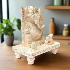 Decorative Chowki Ganesha idol made of Sawan wood with intricate handwork.
