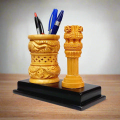 Decorative wooden pen holder with Ashoka Pillar inspired design.