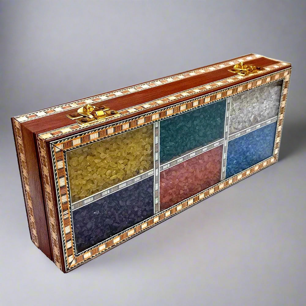 Decorative wooden box featuring traditional gemstone art on the lid.