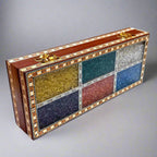 Decorative wooden box featuring traditional gemstone art on the lid.