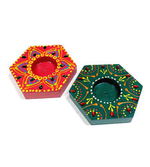 A decorative wooden candle stand gift set, a perfect present for a housewarming.