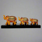 Charming wooden elephant family on a bridge platform, perfect for adding whimsy and warmth to any space