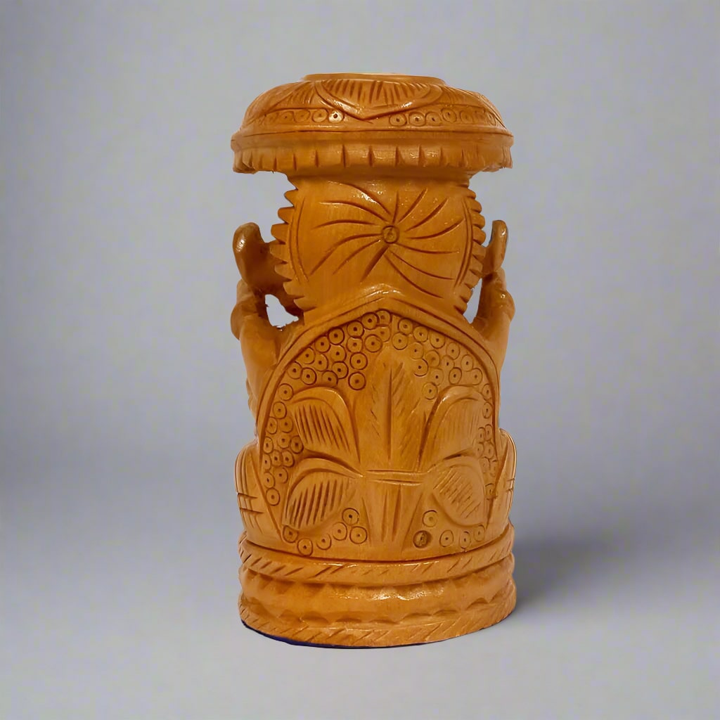 Single-piece wooden umbrella Ganesha figurine with intricate carvings and natural wood grain texture