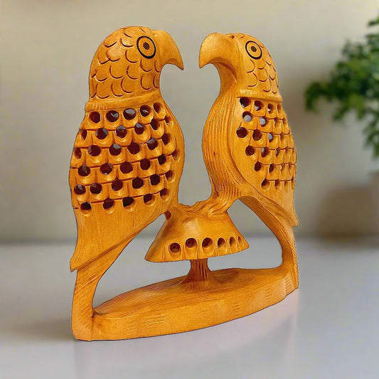 Decorative wooden parrot figurine featuring detailed undercut design.