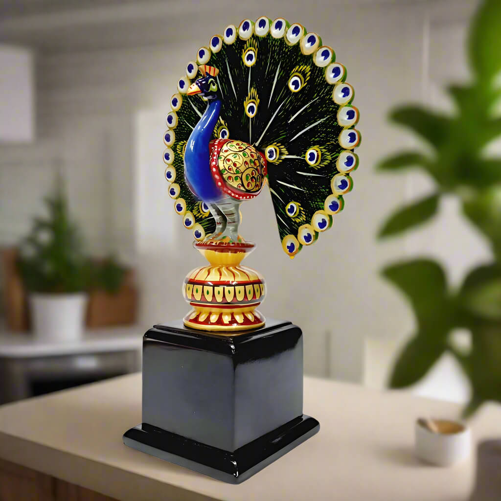 Decorative wooden dancing peacock mounted on a wooden base, featuring detailed hand painting for home or office decor.