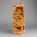Wooden Ganesh statue with fine carving and umbrella, ideal for home altar and spiritual spaces