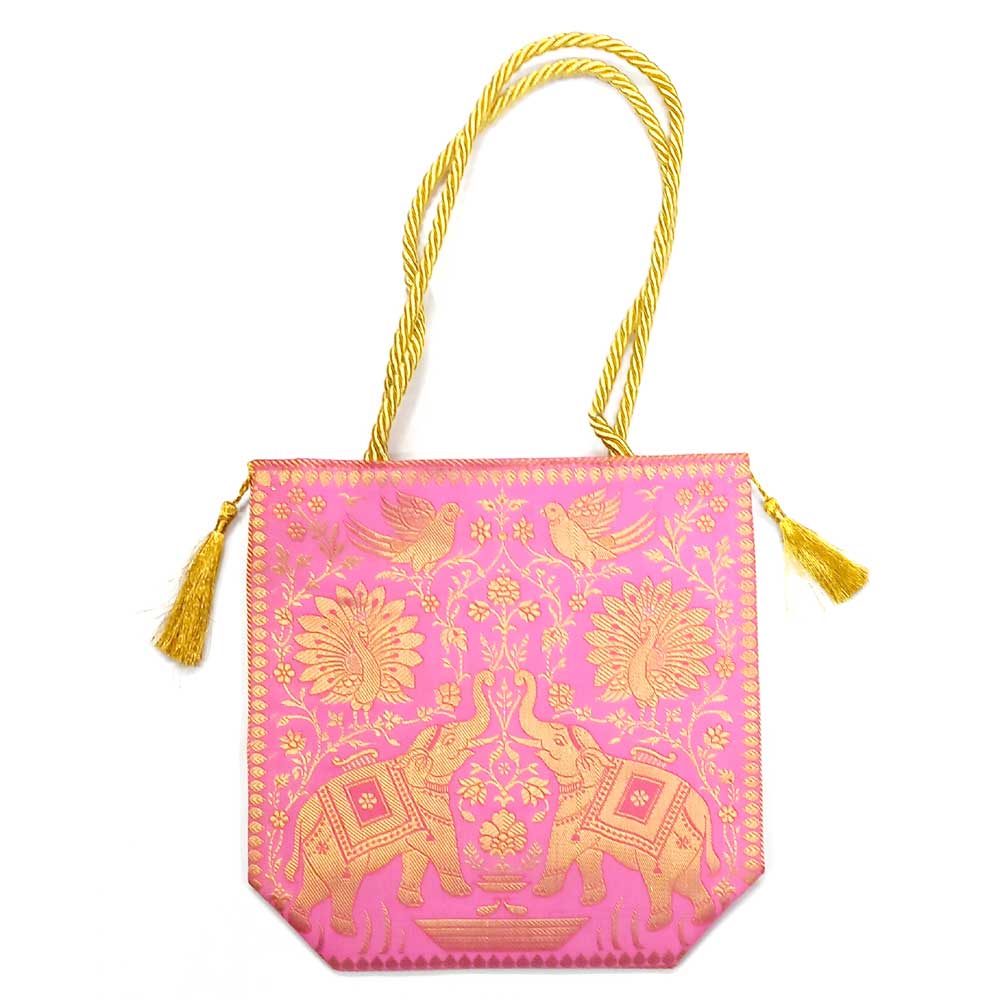 A designer silk purse that can be used as a hand bag or shoulder bag.