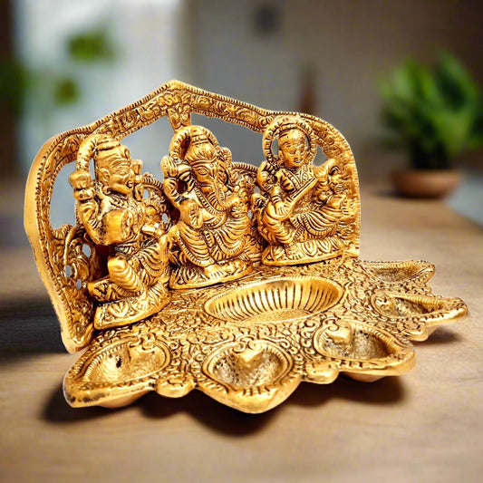 An extremely beautiful Lakshmi, Ganesh, and Saraswati showpiece, an ideal Diwali gift.