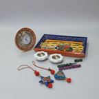 Close-up of Marble Diyas and Meenakari Clock from Diwali Gift Set