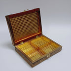 Interior view of the premium dry fruit box showing 4 equal wooden partitions for organized storage of nuts and sweets.