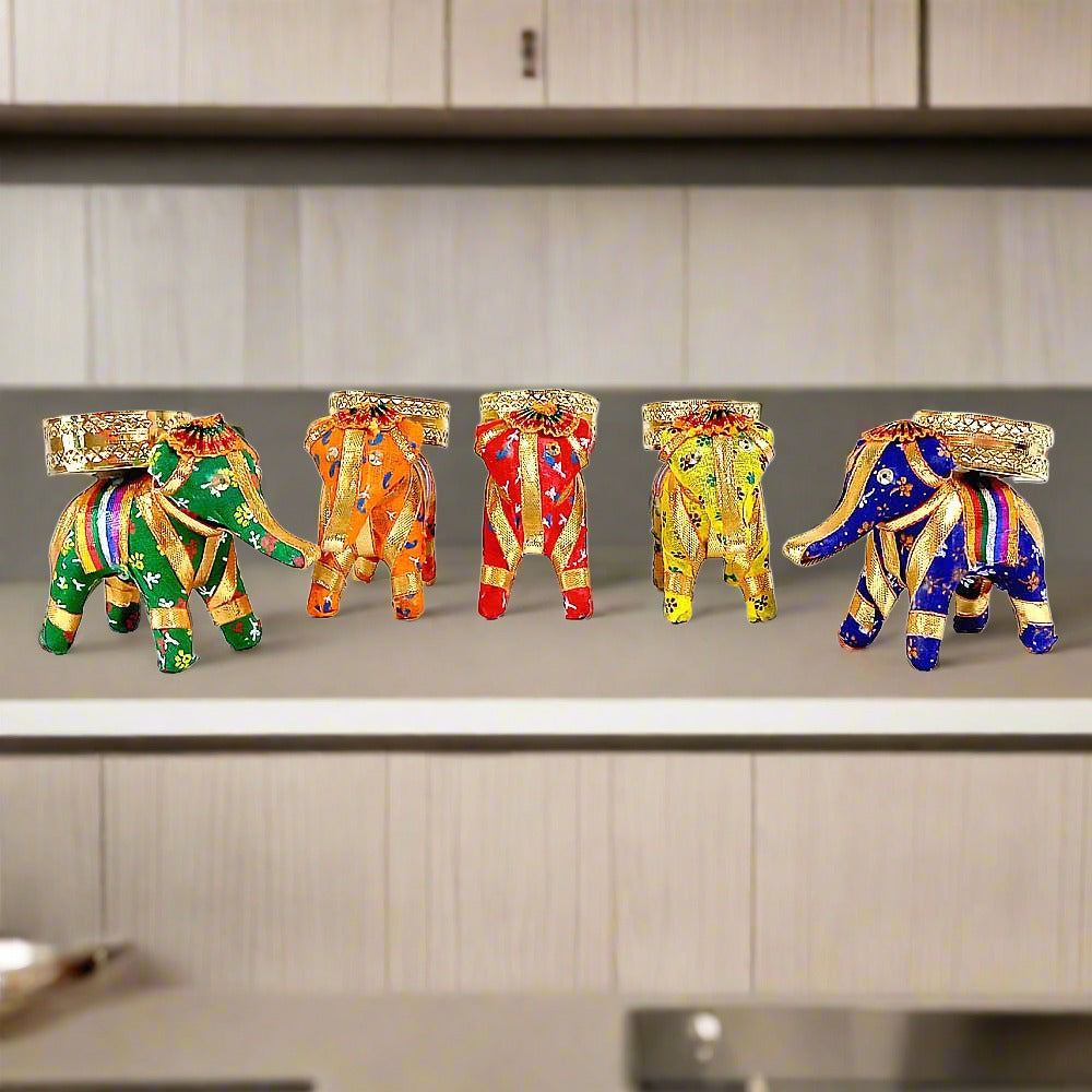 Decorative elephant candle holder set of 5 pieces with colorful designs.