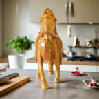 An elegant carved wooden horse statue, a perfect gift for any occasion.