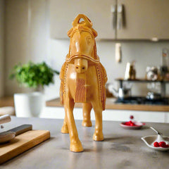 An elegant carved wooden horse statue, a perfect gift for any occasion.