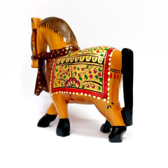 An elegant wooden horse sculpture, a beautiful and timeless decorative piece for any tabletop.