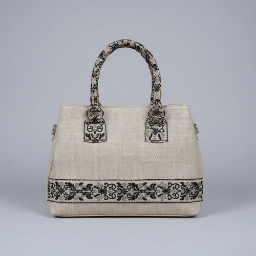 Elegant woven texture handbag with dual top handles and premium tactile finish from KK Gift Store.