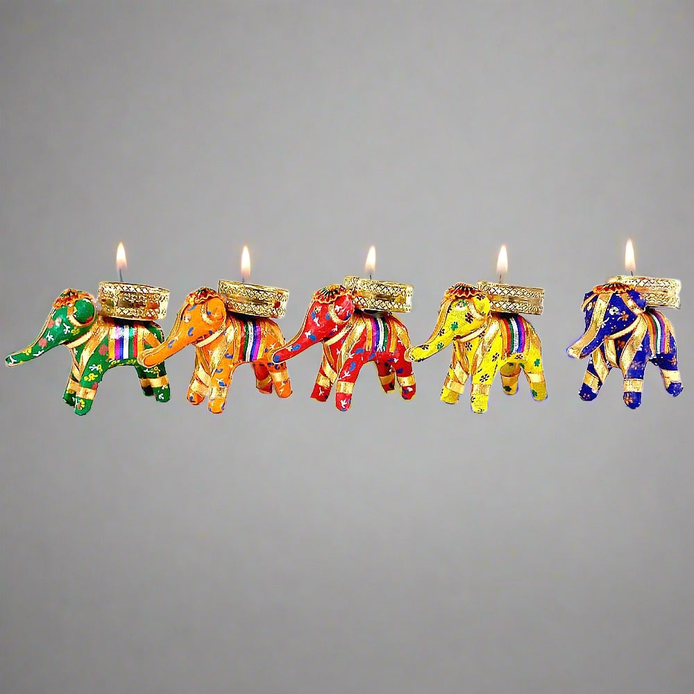 Elephant design handicraft candle stand made with cotton fabric and sequins.