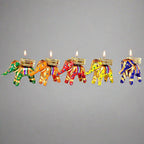 Elephant design handicraft candle stand made with cotton fabric and sequins.