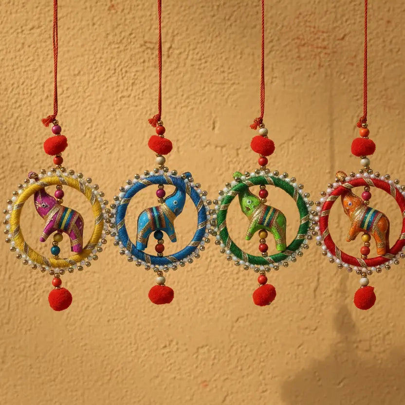 Handcrafted Fabric Elephant Ring Hanging in Four Colours — Yellow, Blue, Green and Red — with Pearl and Silver Bead Border, Red Cord and Red Pom Poms