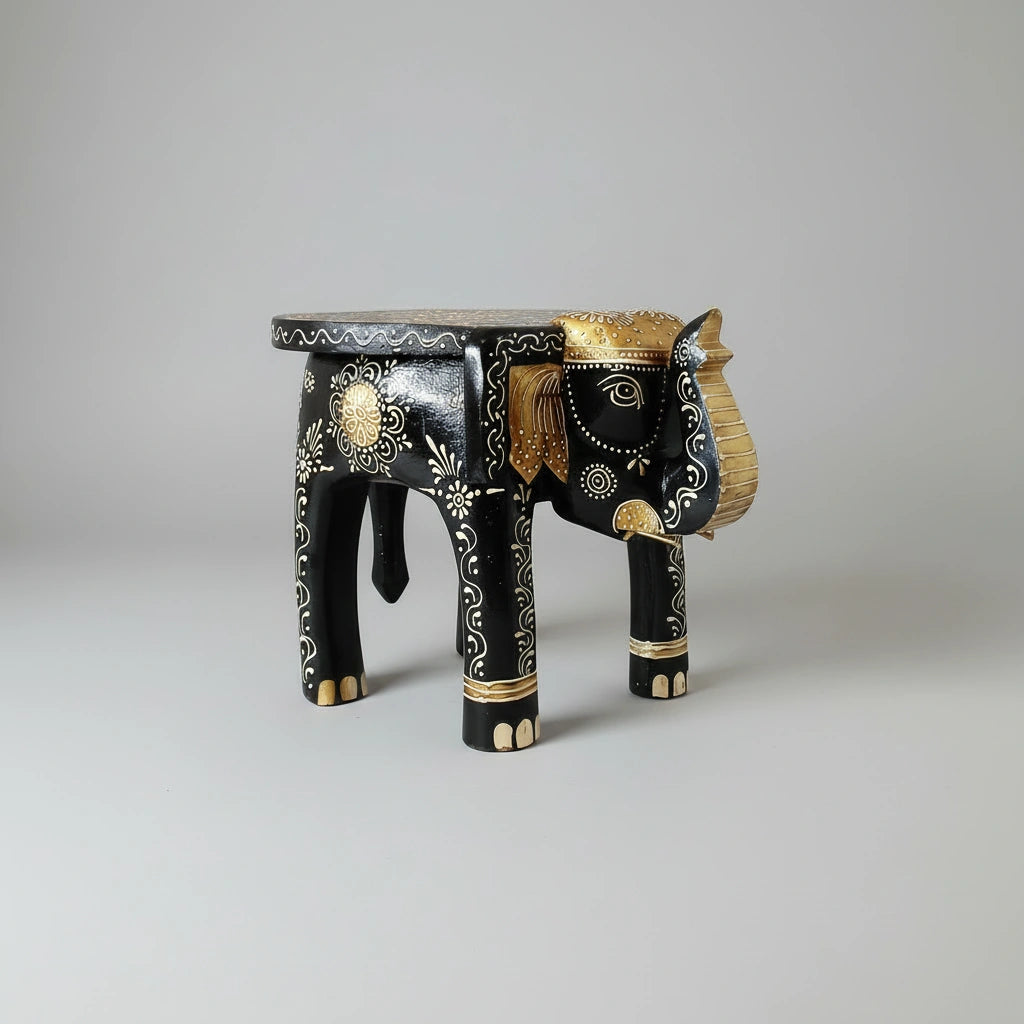 Intricate hand-painted elephant plant stand with raised gold and color motifs from Jaipur.