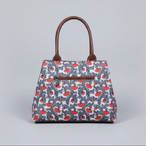 Rear view of ethnic handbag showing the secure back side zipper pocket.