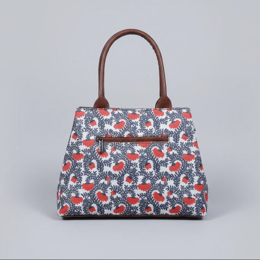 Rear view of ethnic handbag showing the secure back side zipper pocket.