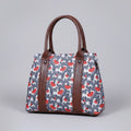 Premium floral print ethnic handbag made of cotton fabric with dual zips.
