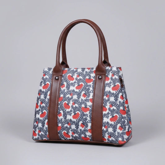 Premium floral print ethnic handbag made of cotton fabric with dual zips.