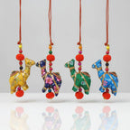 Handcrafted Cotton Printed Fabric Camel Hanging in Four Colours — Yellow, Blue, Green and Sky Blue — with Gold Detailing, Red Cord and Red Pom Poms