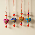 Handcrafted Cotton Printed Fabric Heart Hanging in Four Colours — Pink, Blue, Orange and Sky Blue — with Mandala Lace Patch, Red Cord and Orange Pom Poms