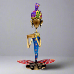 Handmade metal figurine tea light candle holder with intricate painting and durable finish.