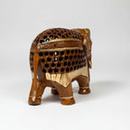 Rajasthani wooden elephant figurine featuring intricate undercut carvings