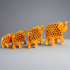 Wooden elephant family set in 4, 3, 2.5, 2 inch sizes