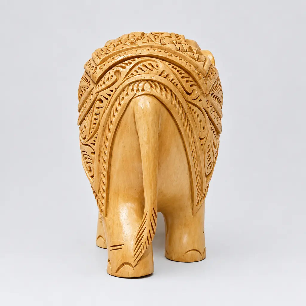 Back view of 4-inch floral carved wooden elephant statue