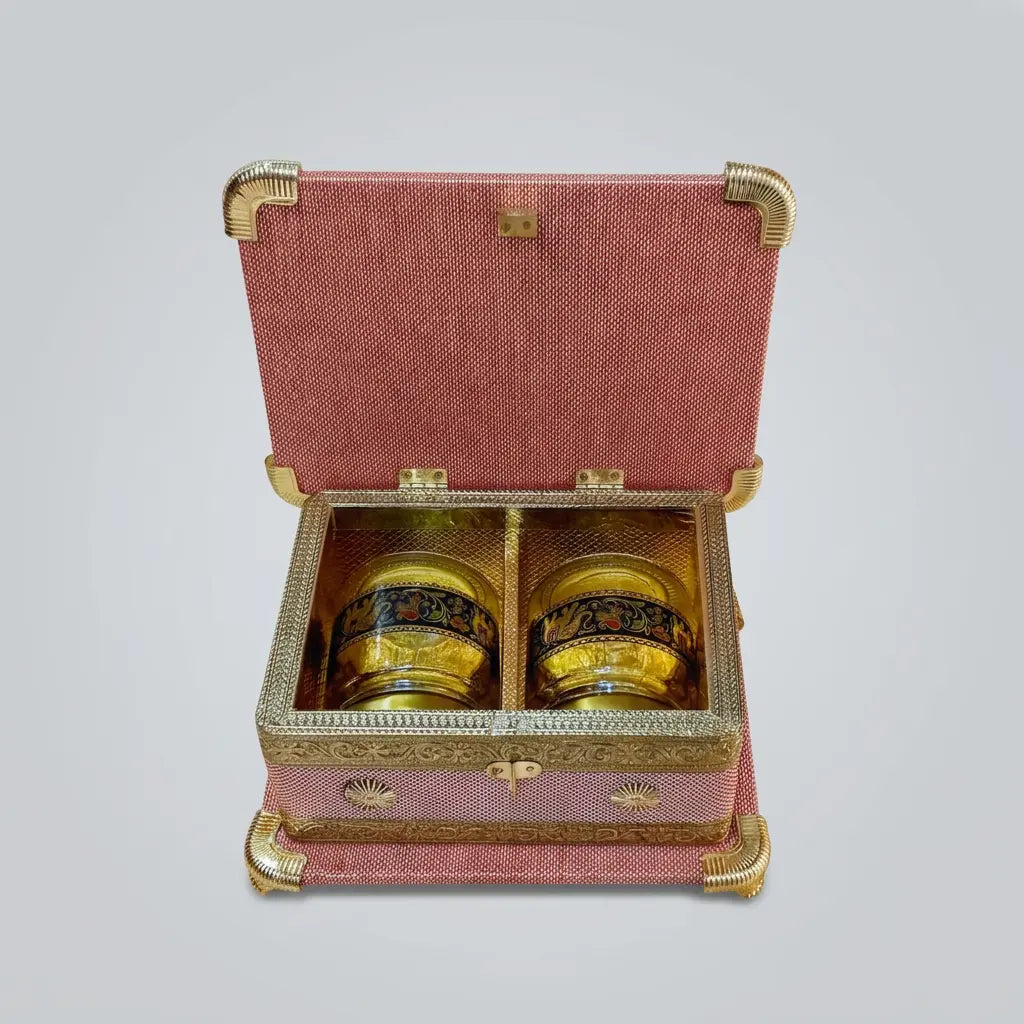 Open pink decorative dry fruit box with two jars placed in separate interior sections