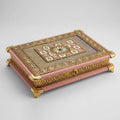 Closed floral wedding return gift box showing its decorative lid, front clasp and pink fabric exterior