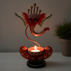 25cm tall metal Ganesh idol featuring a secure tealight holder for pooja and meditation.